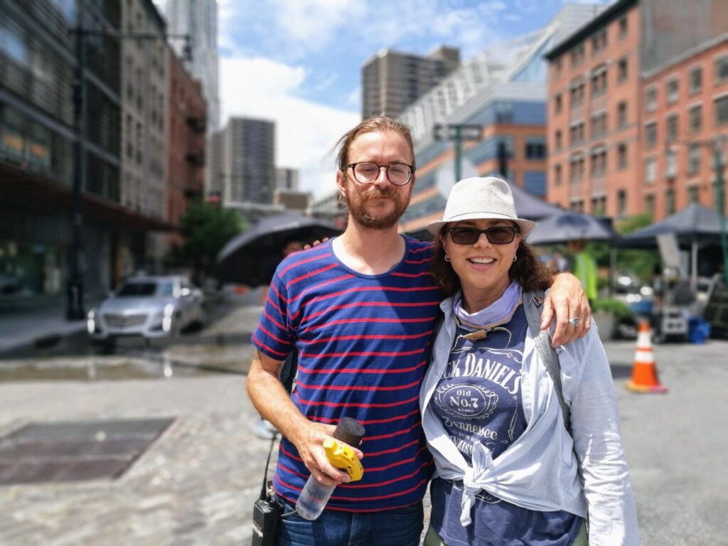 Commercial photography rep, Andrea Stern, is pictured outdoors on set with photographer Jeff Stockwell.
